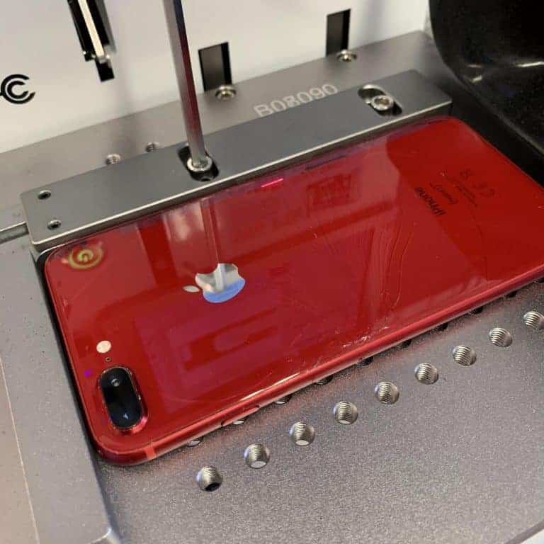image of iPhone 8 Plus in a laser machine | Backglass replacement