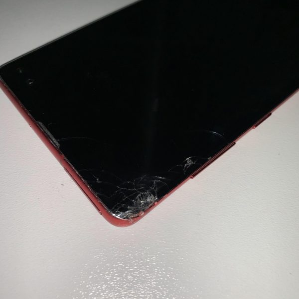 Image of a Samsung S10 Plus with a cracked display