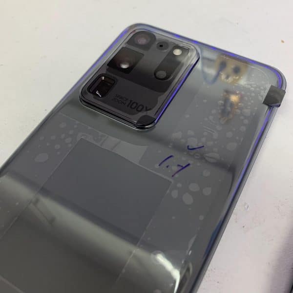 image of Galaxy S20 Ultra with smashed cracked back repaired