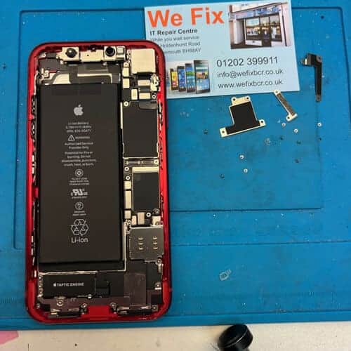 iPhone XR With old water resistant seal removed and housing cleaned