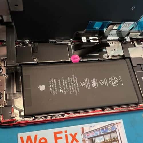 iPhone XR screen repaired with warranty sticker in place